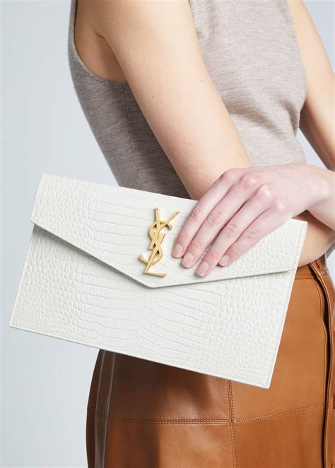 ysl embossed clutch|YSL uptown clutch.